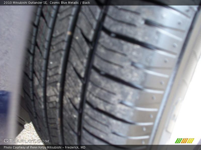 Cosmic Blue Metallic / Black 2010 Mitsubishi Outlander SE