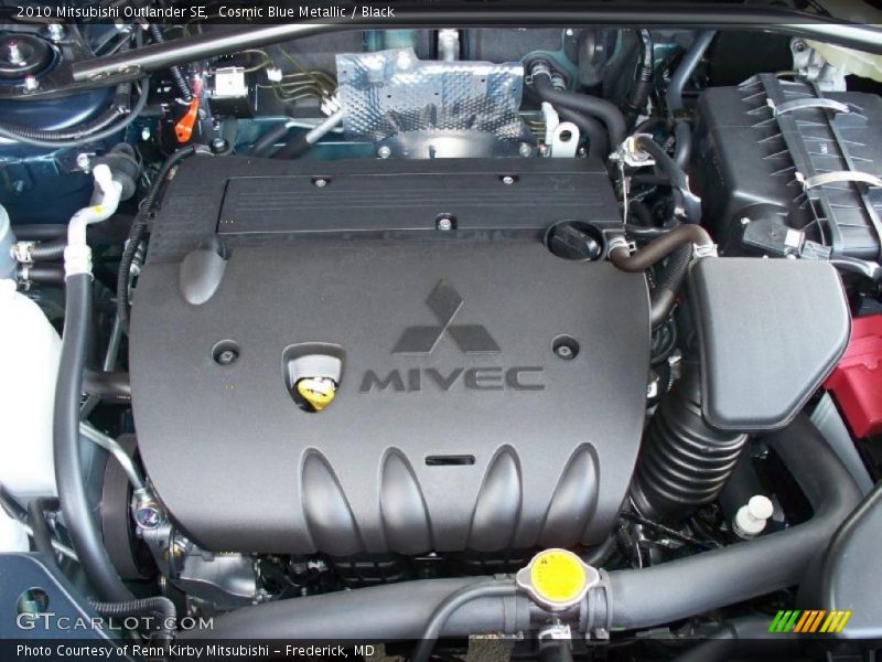 Cosmic Blue Metallic / Black 2010 Mitsubishi Outlander SE