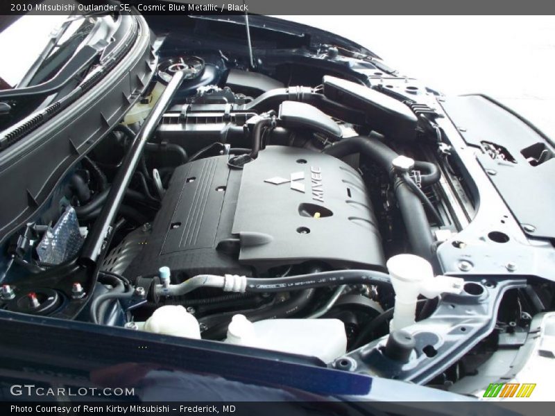 Cosmic Blue Metallic / Black 2010 Mitsubishi Outlander SE