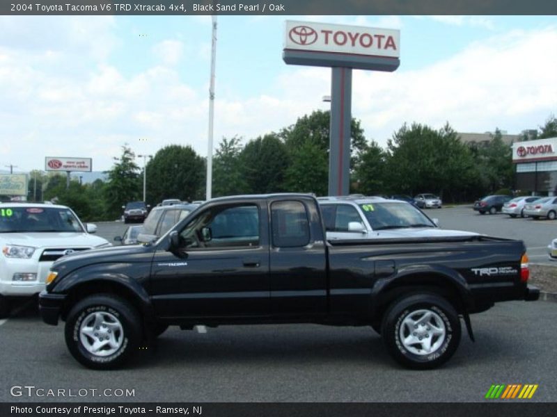 Black Sand Pearl / Oak 2004 Toyota Tacoma V6 TRD Xtracab 4x4