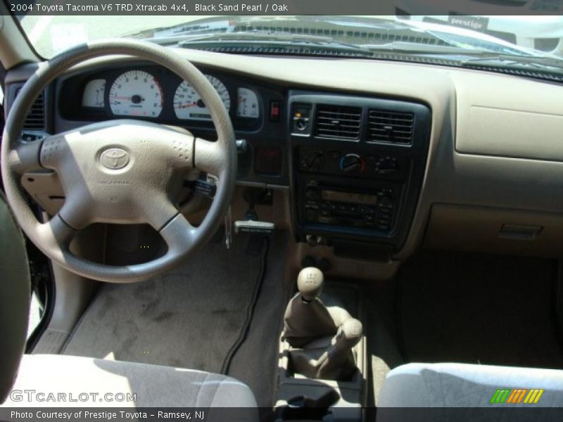 Black Sand Pearl / Oak 2004 Toyota Tacoma V6 TRD Xtracab 4x4