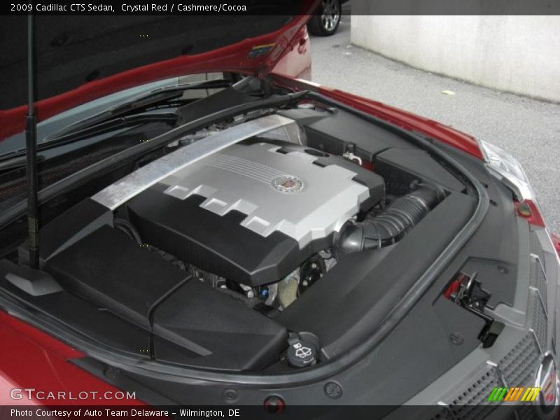 Crystal Red / Cashmere/Cocoa 2009 Cadillac CTS Sedan