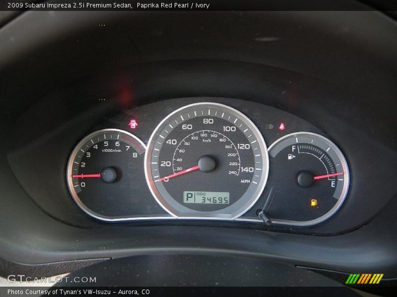Paprika Red Pearl / Ivory 2009 Subaru Impreza 2.5i Premium Sedan