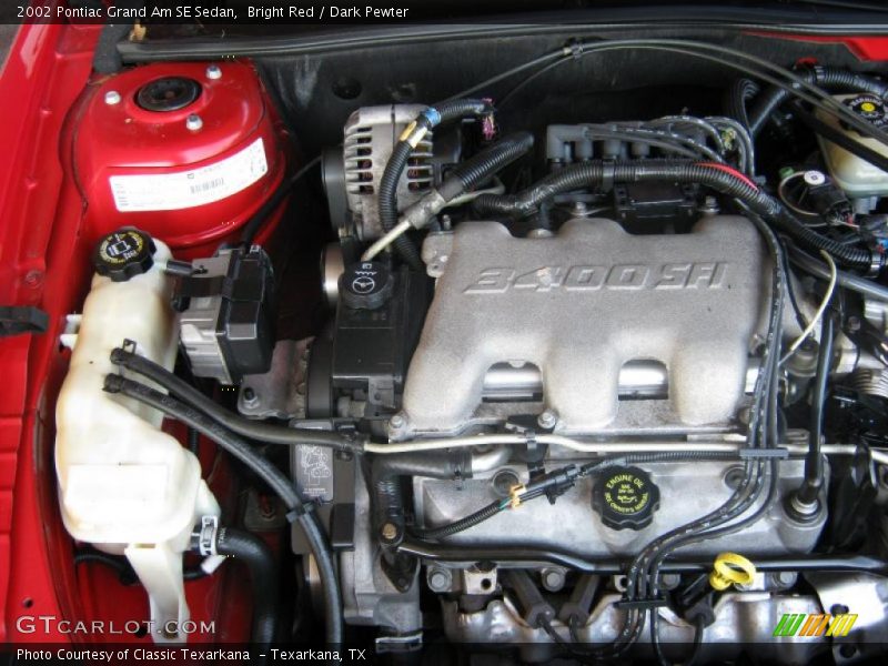 Bright Red / Dark Pewter 2002 Pontiac Grand Am SE Sedan