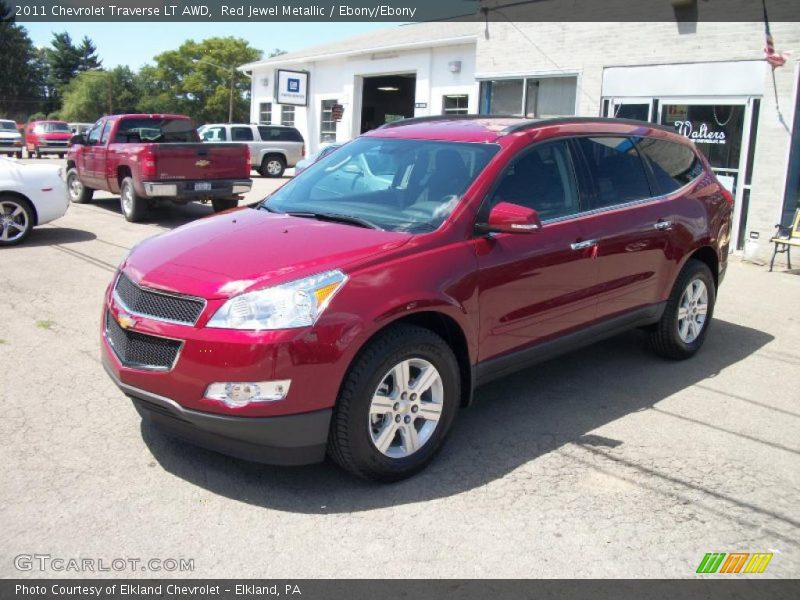 Red Jewel Metallic / Ebony/Ebony 2011 Chevrolet Traverse LT AWD