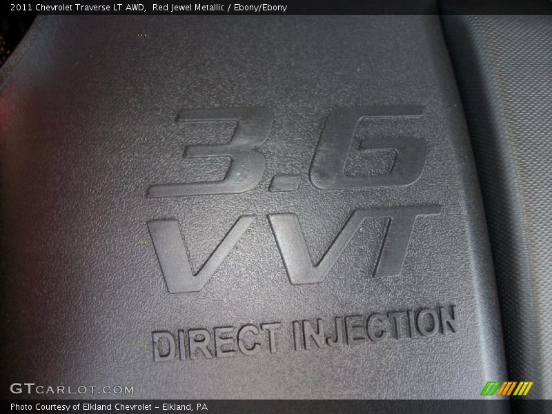 Red Jewel Metallic / Ebony/Ebony 2011 Chevrolet Traverse LT AWD