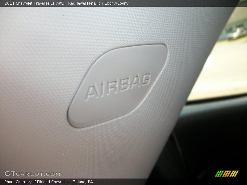 Red Jewel Metallic / Ebony/Ebony 2011 Chevrolet Traverse LT AWD