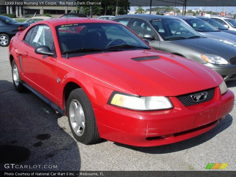 Rio Red / Dark Charcoal 1999 Ford Mustang V6 Coupe