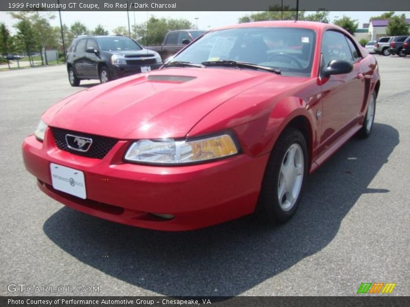 Rio Red / Dark Charcoal 1999 Ford Mustang GT Coupe