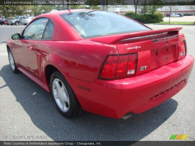 Rio Red / Dark Charcoal 1999 Ford Mustang GT Coupe
