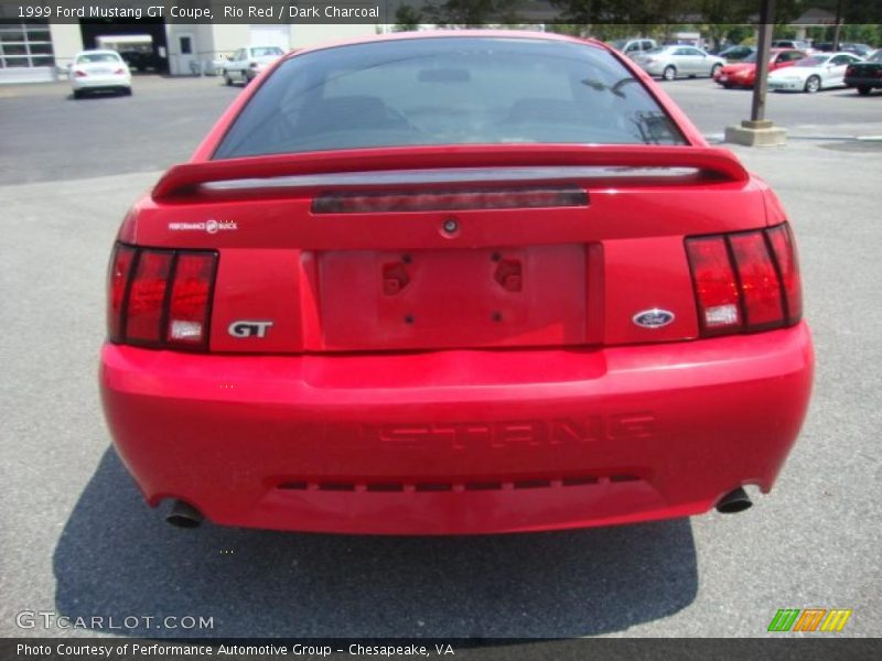 Rio Red / Dark Charcoal 1999 Ford Mustang GT Coupe