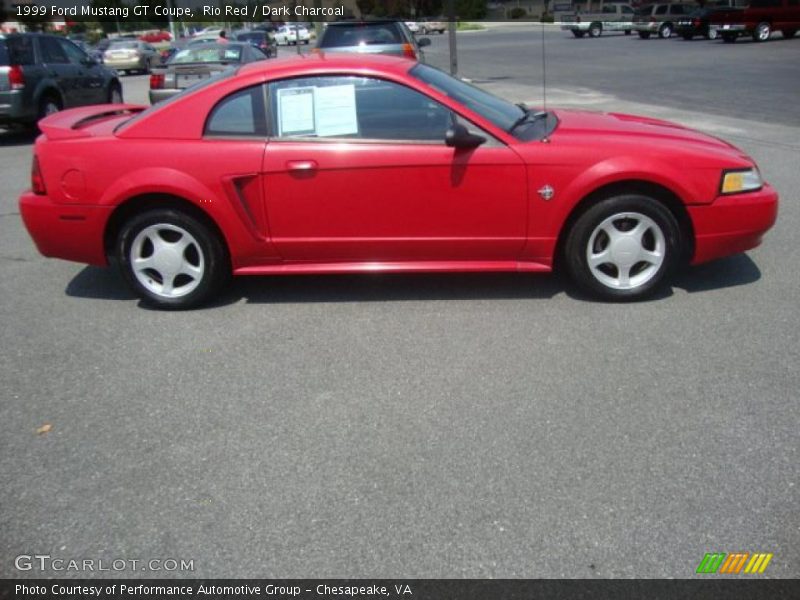 Rio Red / Dark Charcoal 1999 Ford Mustang GT Coupe