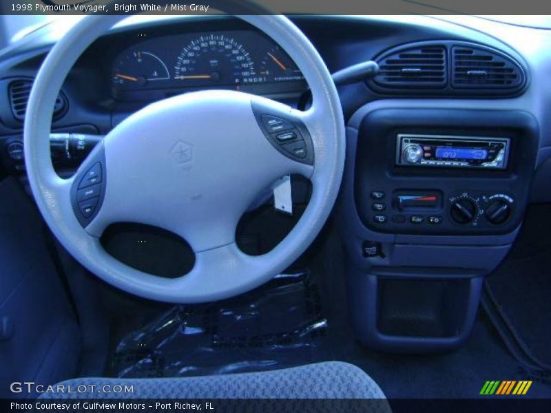 Bright White / Mist Gray 1998 Plymouth Voyager