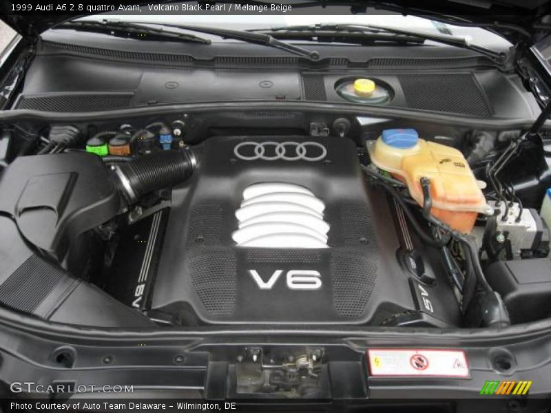 Volcano Black Pearl / Melange Beige 1999 Audi A6 2.8 quattro Avant