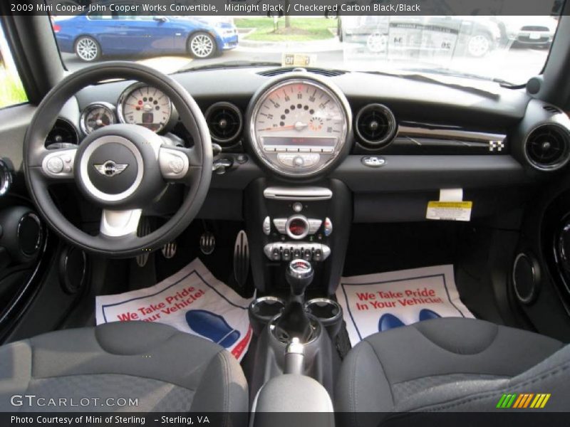 Dashboard of 2009 Cooper John Cooper Works Convertible