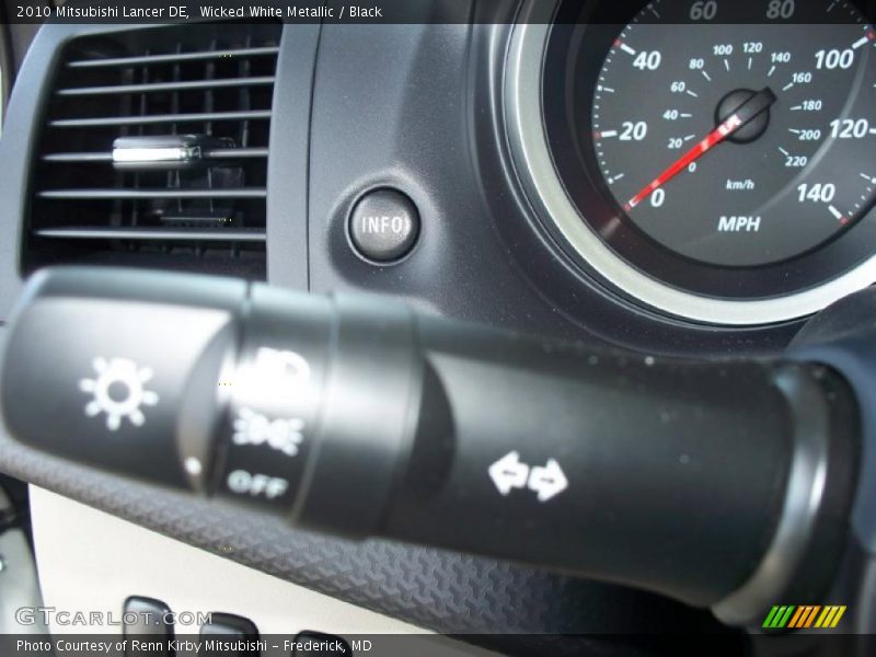 Wicked White Metallic / Black 2010 Mitsubishi Lancer DE