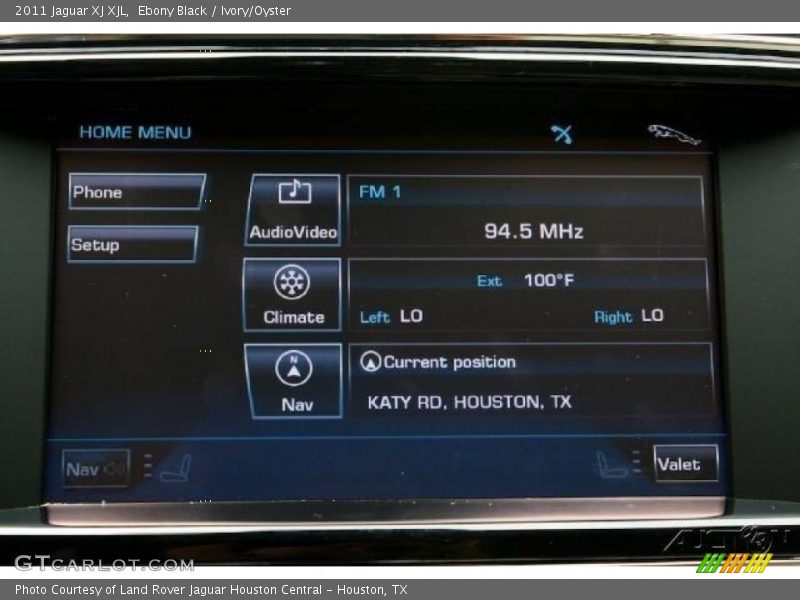 Ebony Black / Ivory/Oyster 2011 Jaguar XJ XJL