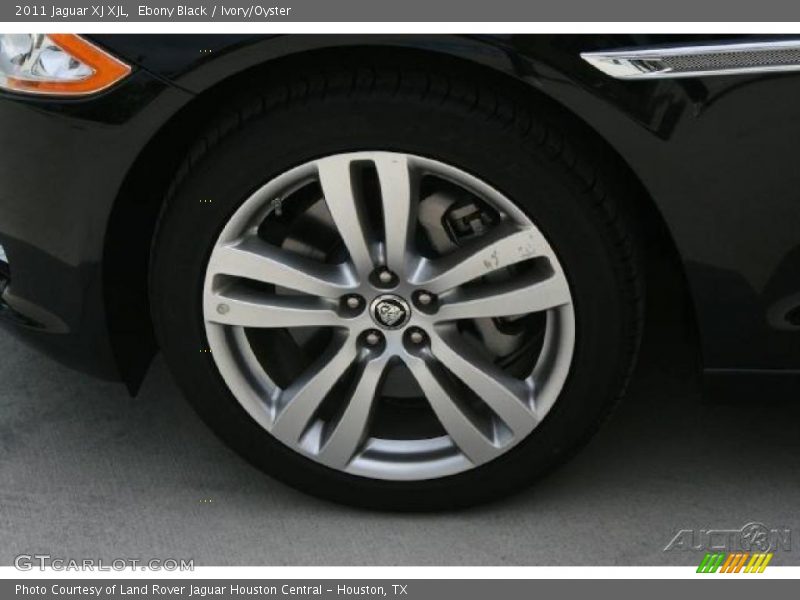 Ebony Black / Ivory/Oyster 2011 Jaguar XJ XJL