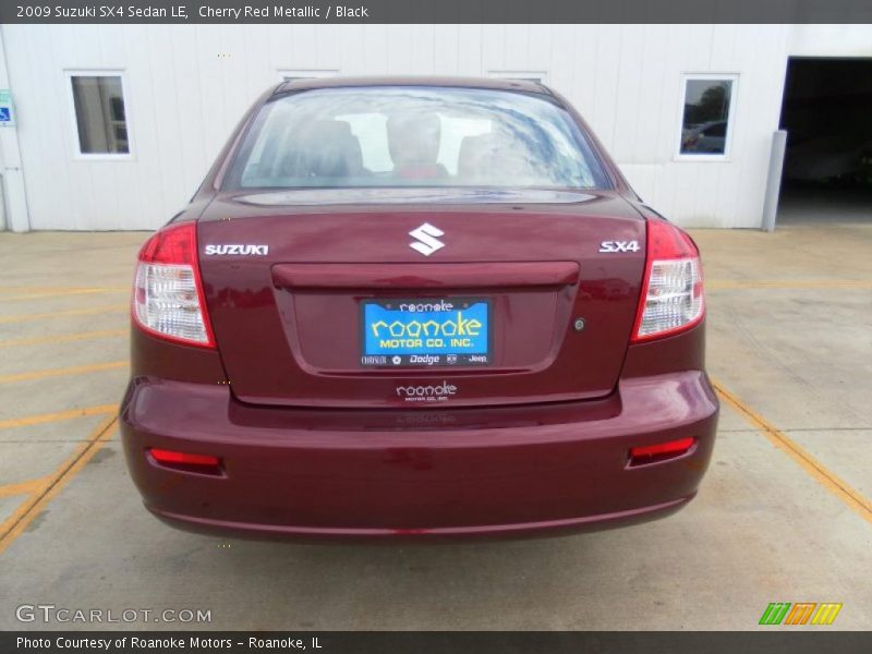 Cherry Red Metallic / Black 2009 Suzuki SX4 Sedan LE