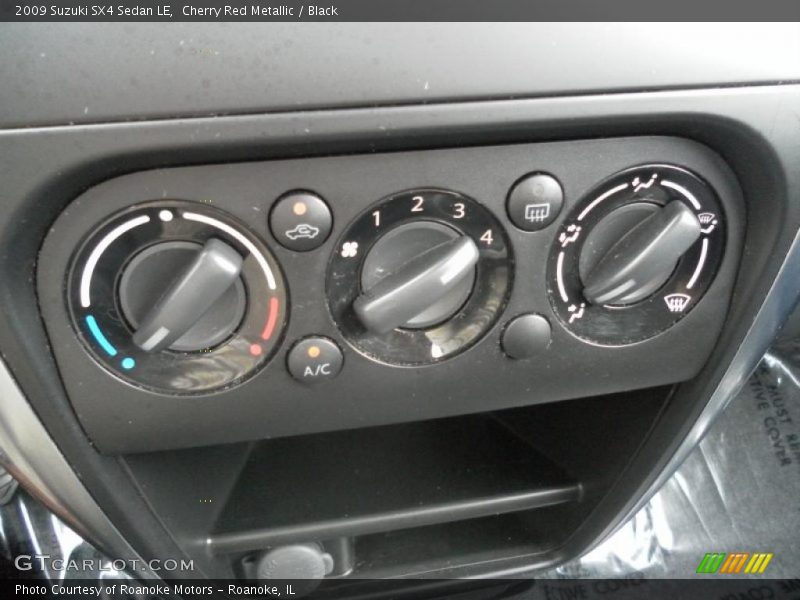 Cherry Red Metallic / Black 2009 Suzuki SX4 Sedan LE