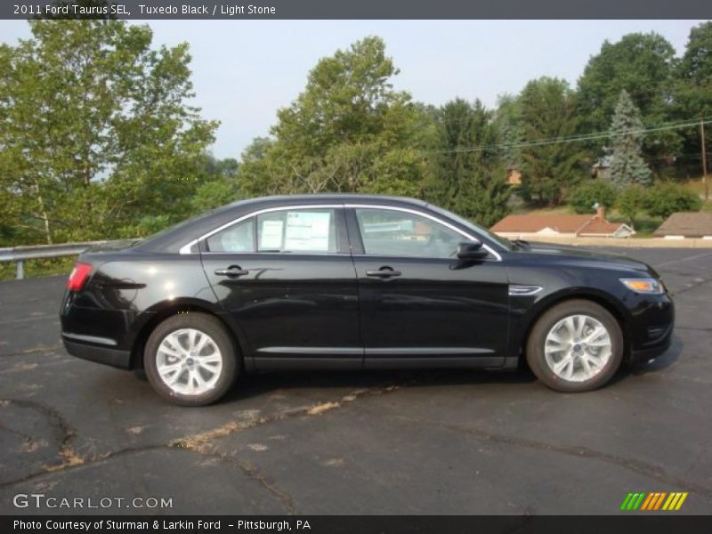 Tuxedo Black / Light Stone 2011 Ford Taurus SEL