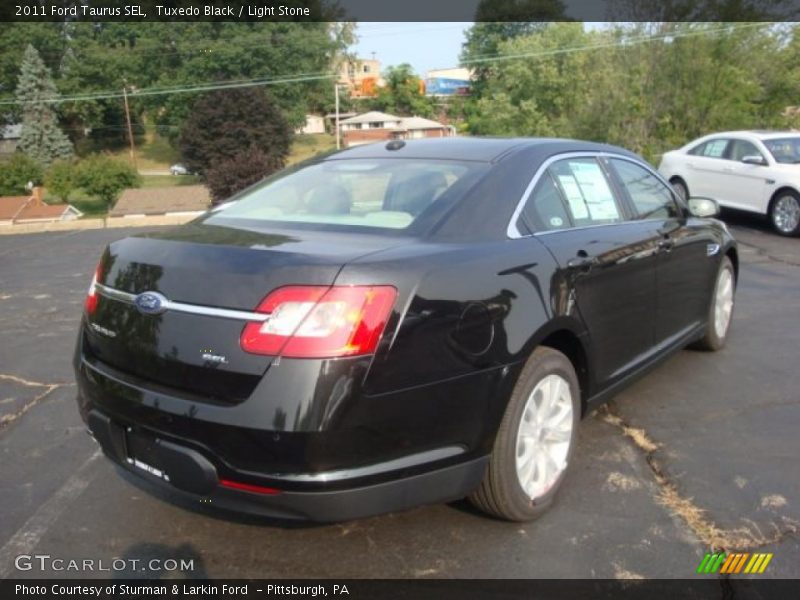 Tuxedo Black / Light Stone 2011 Ford Taurus SEL