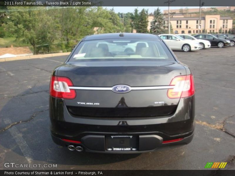Tuxedo Black / Light Stone 2011 Ford Taurus SEL