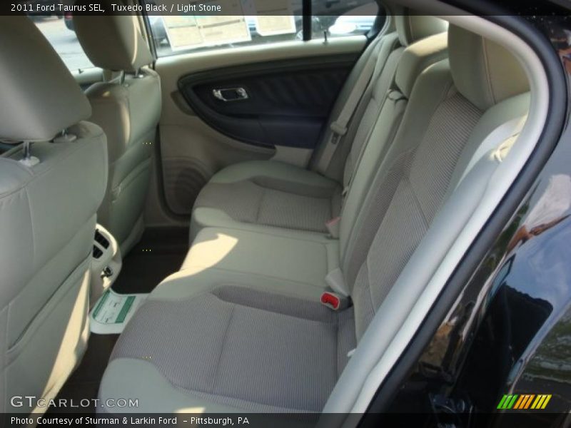 Tuxedo Black / Light Stone 2011 Ford Taurus SEL