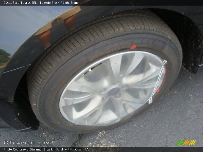 Tuxedo Black / Light Stone 2011 Ford Taurus SEL