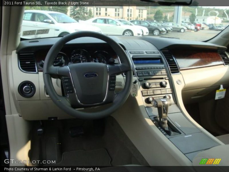 Tuxedo Black / Light Stone 2011 Ford Taurus SEL