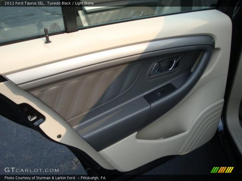Tuxedo Black / Light Stone 2011 Ford Taurus SEL