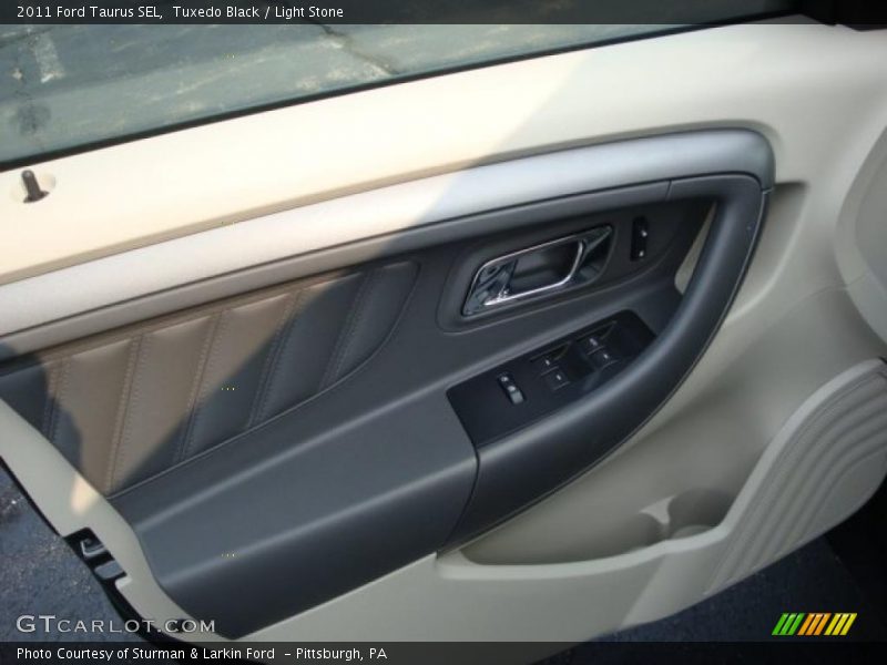 Tuxedo Black / Light Stone 2011 Ford Taurus SEL