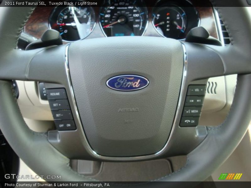 Tuxedo Black / Light Stone 2011 Ford Taurus SEL