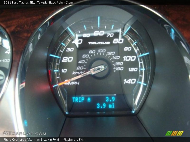 Tuxedo Black / Light Stone 2011 Ford Taurus SEL