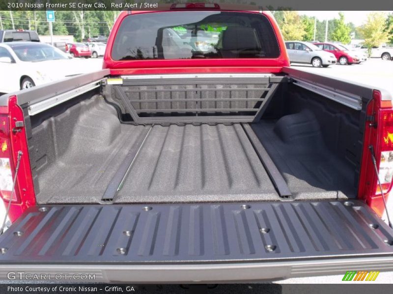 Red Alert / Steel 2010 Nissan Frontier SE Crew Cab