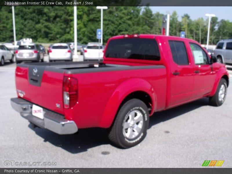 Red Alert / Steel 2010 Nissan Frontier SE Crew Cab