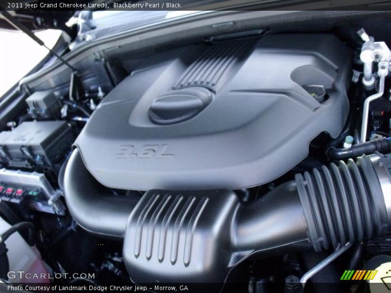 Blackberry Pearl / Black 2011 Jeep Grand Cherokee Laredo