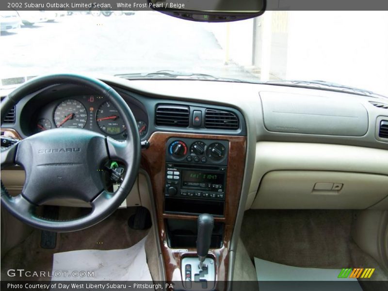 White Frost Pearl / Beige 2002 Subaru Outback Limited Sedan