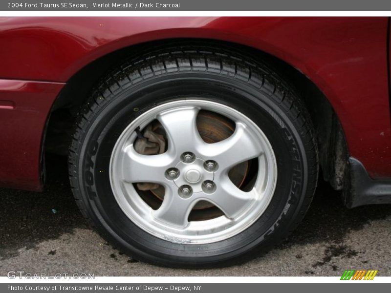 Merlot Metallic / Dark Charcoal 2004 Ford Taurus SE Sedan