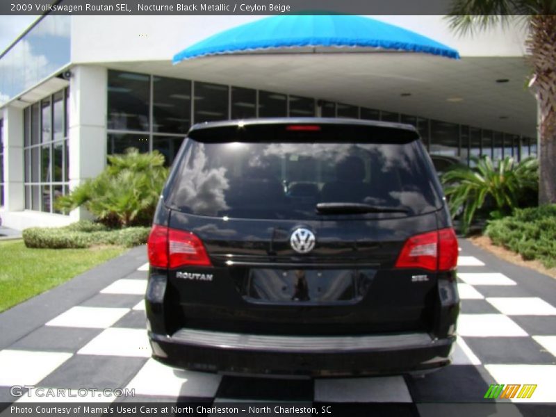 Nocturne Black Metallic / Ceylon Beige 2009 Volkswagen Routan SEL