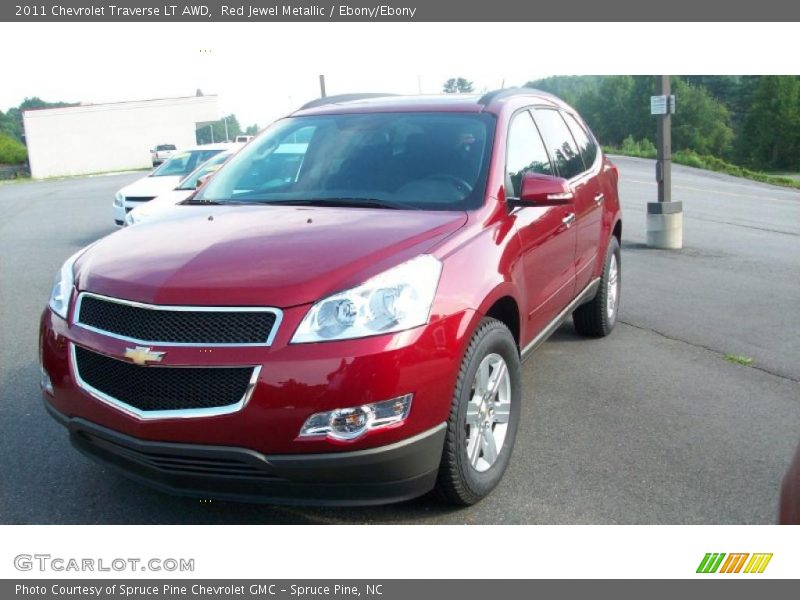 Red Jewel Metallic / Ebony/Ebony 2011 Chevrolet Traverse LT AWD