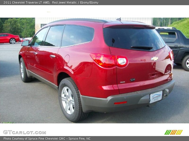 Red Jewel Metallic / Ebony/Ebony 2011 Chevrolet Traverse LT AWD