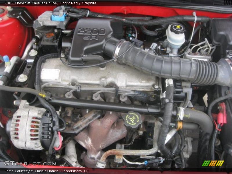 Bright Red / Graphite 2002 Chevrolet Cavalier Coupe