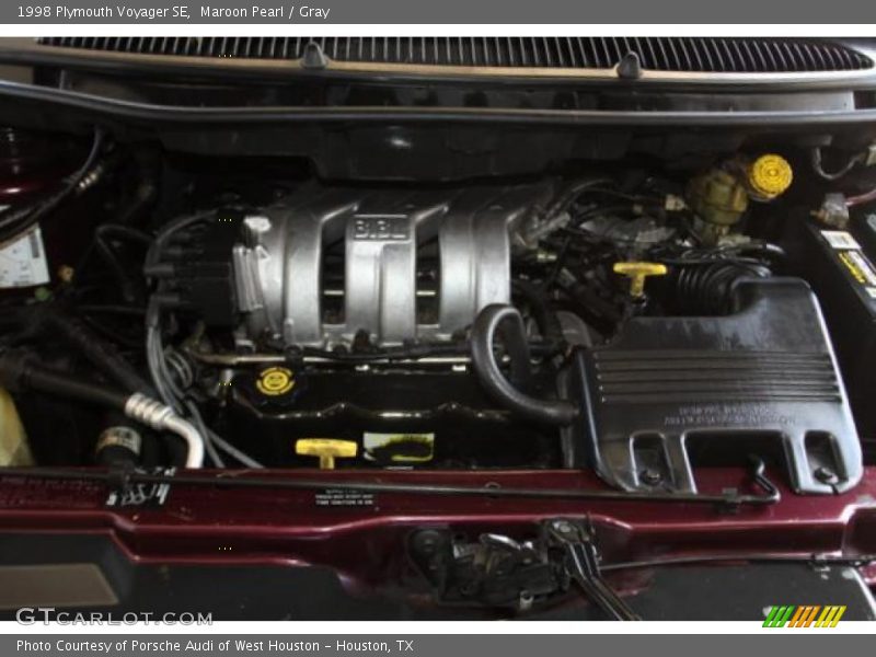 Maroon Pearl / Gray 1998 Plymouth Voyager SE