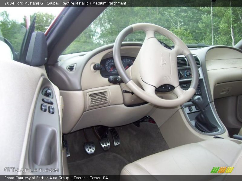 Redfire Metallic / Medium Parchment 2004 Ford Mustang GT Coupe