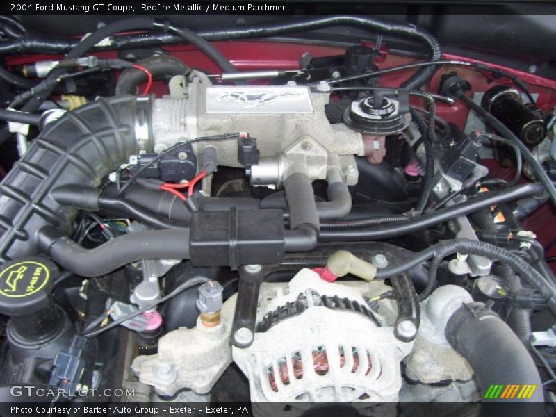 Redfire Metallic / Medium Parchment 2004 Ford Mustang GT Coupe