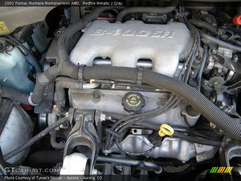Redfire Metallic / Gray 2002 Pontiac Montana MontanaVision AWD