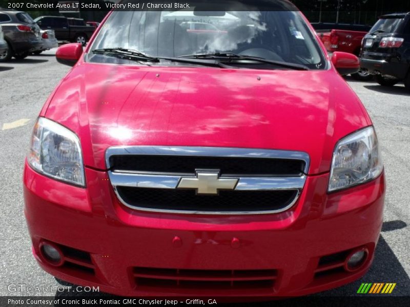 Victory Red / Charcoal Black 2007 Chevrolet Aveo LT Sedan