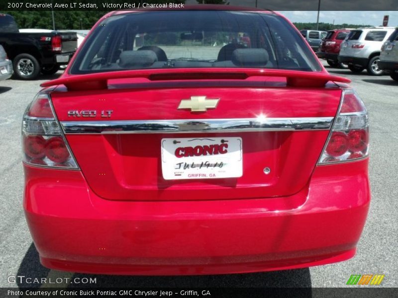 Victory Red / Charcoal Black 2007 Chevrolet Aveo LT Sedan