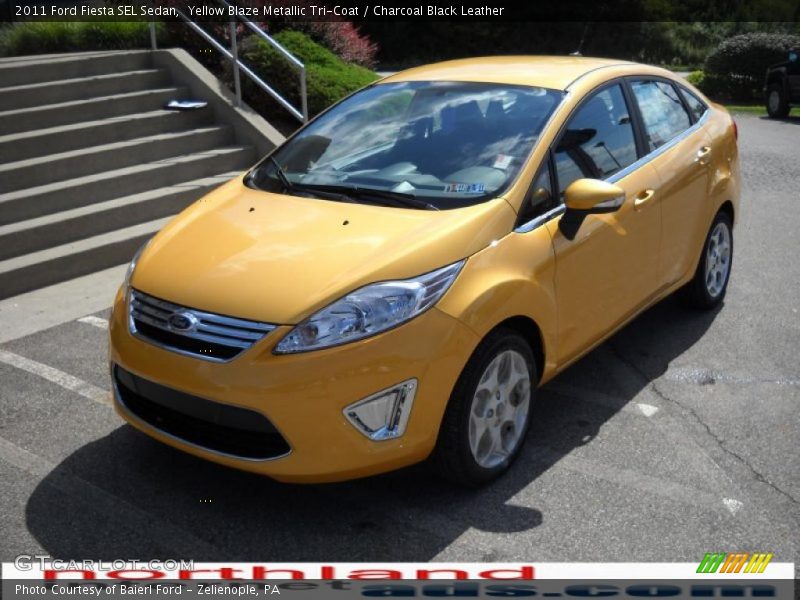 Yellow Blaze Metallic Tri-Coat / Charcoal Black Leather 2011 Ford Fiesta SEL Sedan